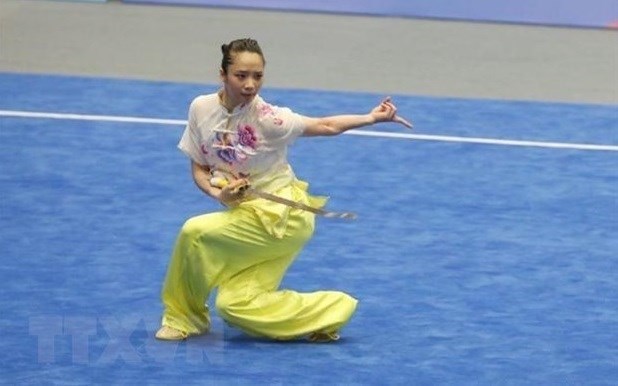 Спортсменка по ушу Зыонг Тху Ви выиграла золото на Всемирных играх hinh anh 2