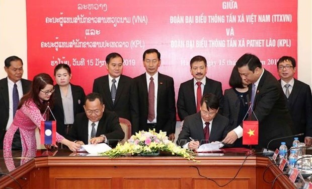 Сердечные отношения между информационными агентствами Вьетнама, Лаоса hinh anh 1