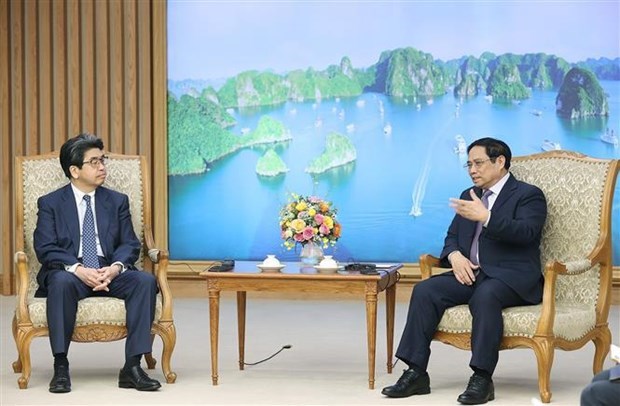 Премьер-министр Фам Минь Тьинь принял руководителя JBIC hinh anh 1