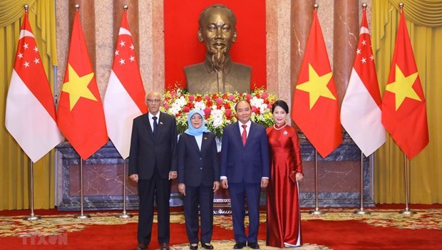 Президент Сингапура завершила государственныи визит hinh anh 1