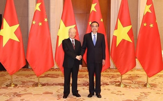 Генеральныи секретарь Нгуен Фу Чонг имел встречу с премьер-министром Китая hinh anh 1