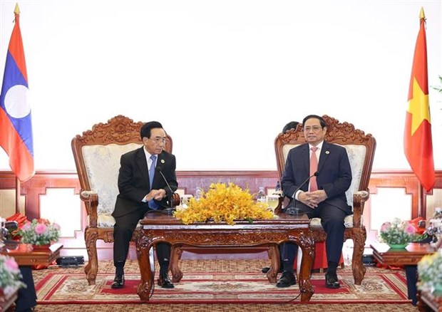 Премьер-министр Фам Минь Тьинь провел переговоры с премьер-министром Лаоса Фанхамом Випхаваном hinh anh 2