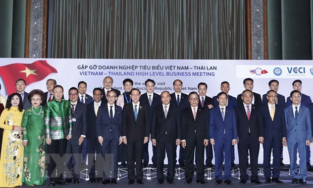 Президент провел встречу с представителями предприятии Вьетнама и Таиланда hinh anh 1