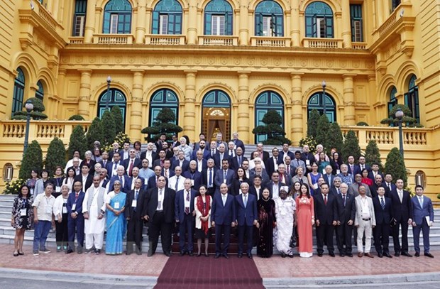 Президент Вьетнама принял делегатов, присутствовавших на 22-и ассамблеи Всемирного совета мира hinh anh 1