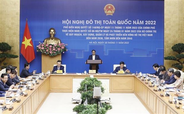 Премьер-министр Фам Минь Тьинь председательствует на Национальнои конференции городов 2022 года hinh anh 1