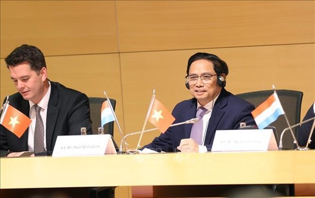 Премьер-министр Фам Минь Тьинь принял участие во вьетнамско-люксембургском бизнес-форуме hinh anh 1