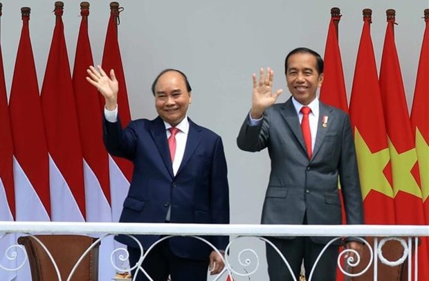 Президент Индонезии председательствует на церемонии встречи президента Нгуен Суан Фука hinh anh 2
