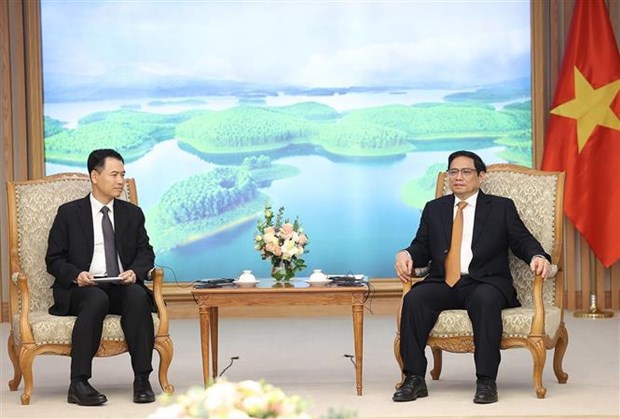 Премьер-министр надеется на укрепление торговых и инвестиционных связеи с Лаосом hinh anh 1