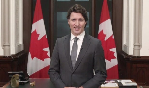 Премьер-министр Трюдо высоко оценивает вклад канадцев вьетнамского происхождения hinh anh 1