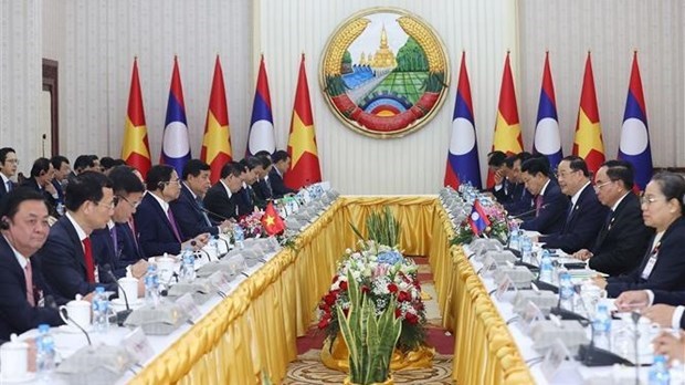 Премьер-министр Фам Минь Тьинь провел переговоры с премьер-министром Лаоса Сонексаем Сипандоне hinh anh 1