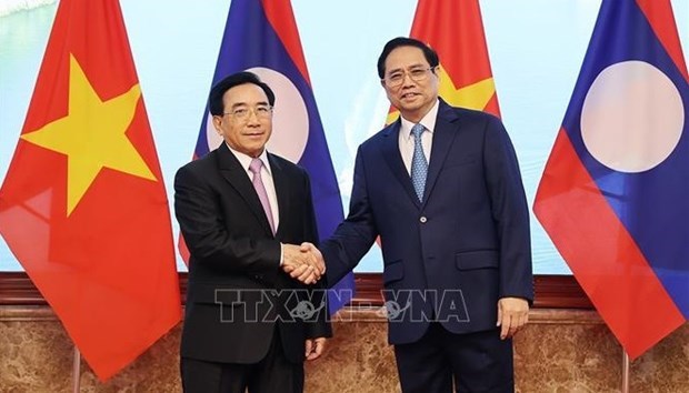 Предстоящии визит премьер-министра в Лаос в завершение Года солидарности и дружбы 2022 hinh anh 3