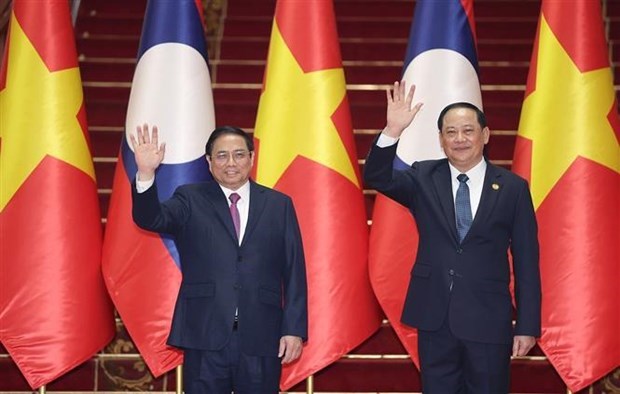Визит премьер-министра в Лаос принес всесторонние и существенные результаты hinh anh 1