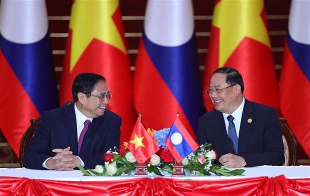 Премьер-министр успешно завершил визит в Лаос hinh anh 2