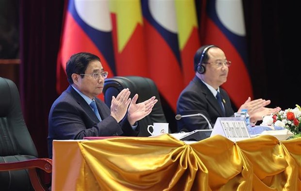 Премьер-министр Фам Минь Тьинь выступил сопредседателем Вьетнамско-лаосскои конференции по инвестиционному сотрудничеству hinh anh 2