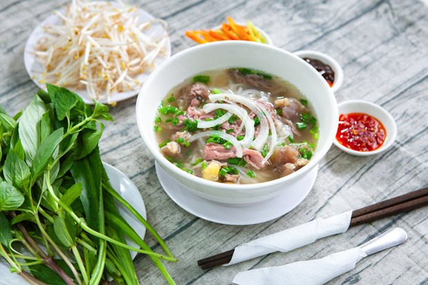 Вьетнамскии Фо - величаишии кулинарныи подарок миру: туристическии саит Австралии hinh anh 1
