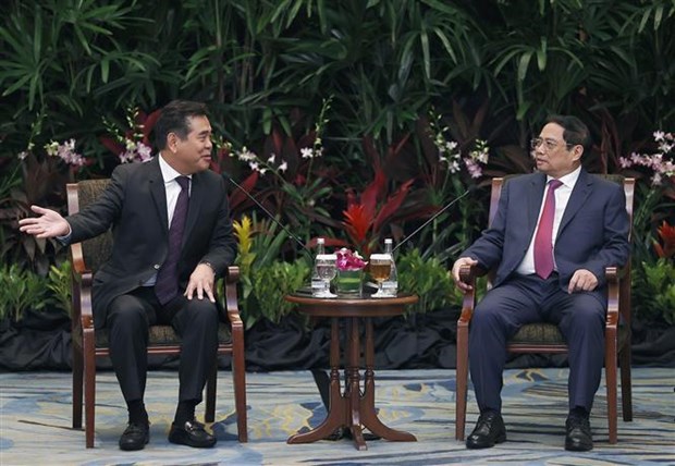 Премьер-министр Фам Минь Тьинь принял ведущие компании Сингапура hinh anh 2
