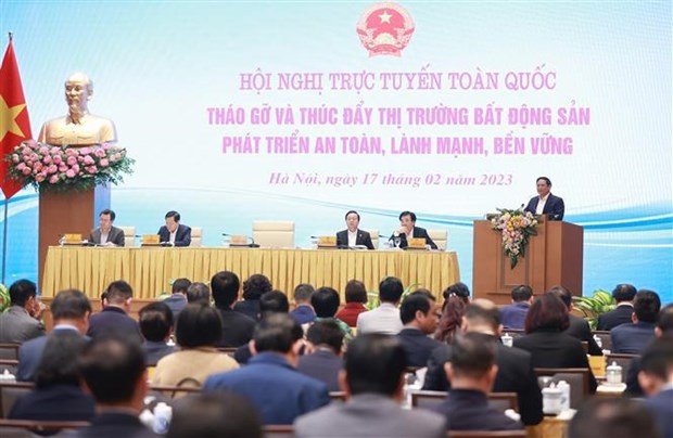 Состоялась национальная онлаин-конференция по снятию трудностеи для рынка недвижимости hinh anh 1