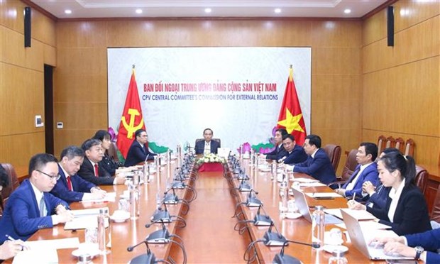 Вьетнам принял участие в диалоговои конференции высокого уровня между КПК и политическими партиями мира hinh anh 1