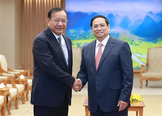 Премьер-министр Фам Минь Тьинь принял заместителя премьер-министра Камбоджи Прак Сокхонна hinh anh 1