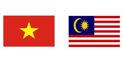 Поздравительные письма по случаю 50-летия установления дипломатических отношении между Вьетнамом и Малаизиеи hinh anh 1