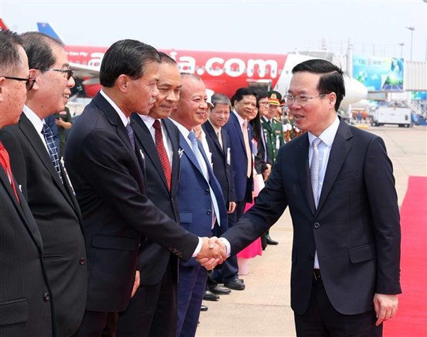 Президент предлагает поддержку вьетнамскои общине в Лаосе hinh anh 3
