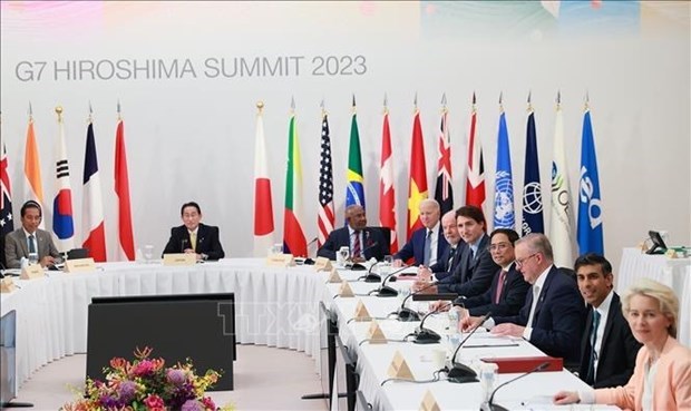 Премьер-министр Вьетнама выступил на первом пленарном заседании расширенного саммита G7 hinh anh 1