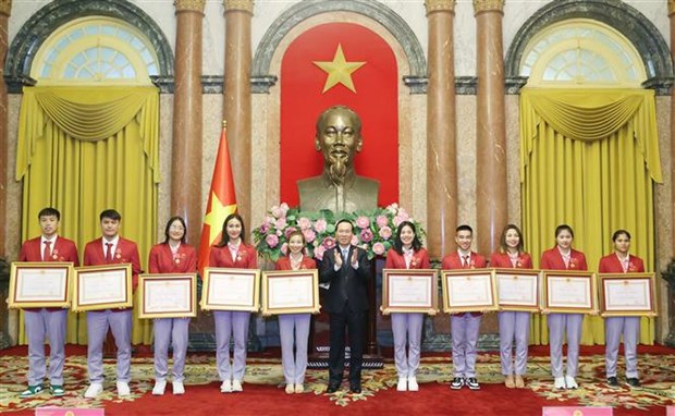 Президент страны устроил прием в честь спортивнои делегации на SEA Games 32 hinh anh 3