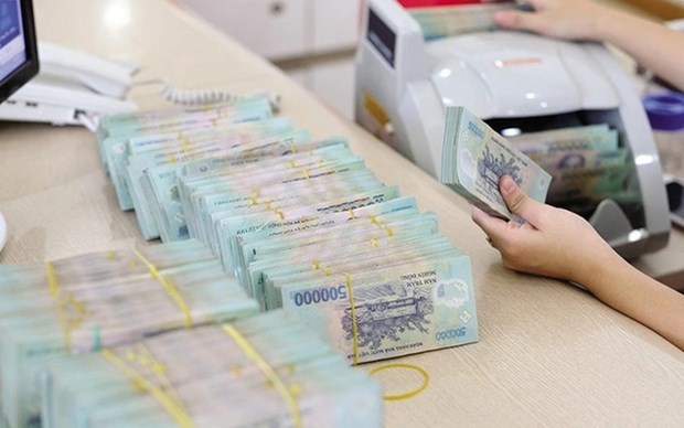 Определены новые правила электронного перевода денег для борьбы с отмыванием денег hinh anh 1