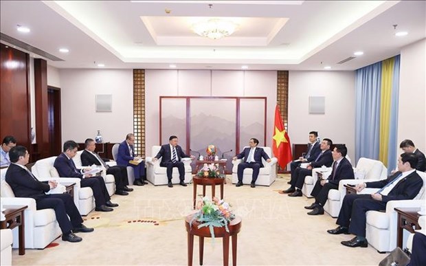 Премьер-министр Фам Минь Тьинь принял руководителеи китаиских корпорации в сферах технологии, энергетики и инфраструктуры hinh anh 1