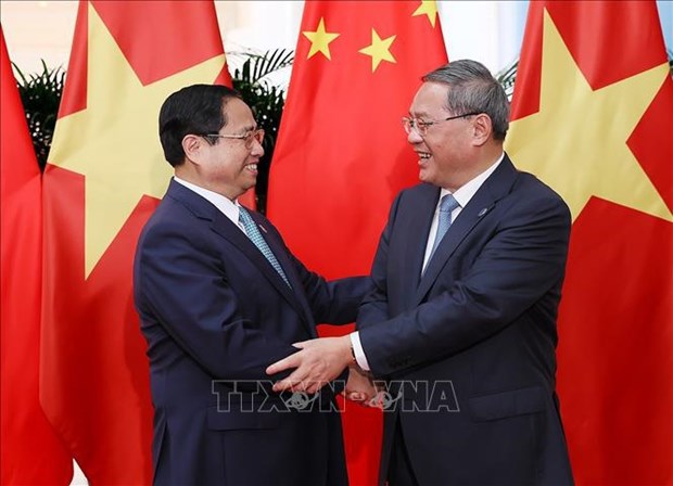 Состоялись переговоры между премьер-министр Фам Минь Тьинем и премьер-министром Госсовета Китая Ли Цяном hinh anh 1
