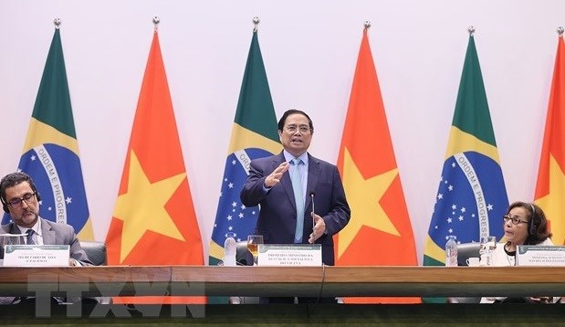 Премьер-министр Фам Минь Тьинь прибыл в Ханои, успешно завершив деловои тур в США и Бразилию hinh anh 2
