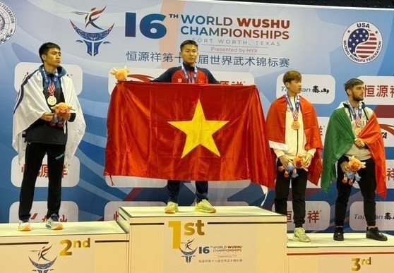Вьетнам занял второе место на 16-м чемпионате мира по ушу hinh anh 1