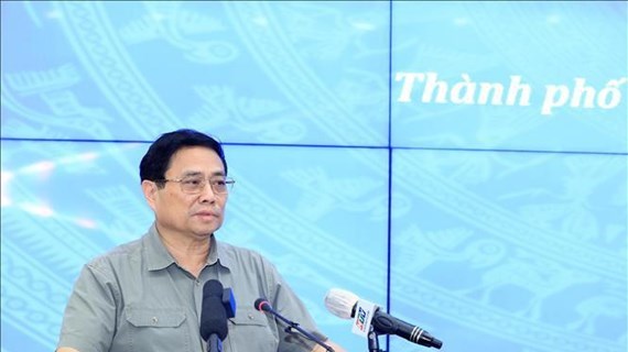 Премьер-министр призвал к более активному внедрению специальных механизмов для города Хошимин hinh anh 1