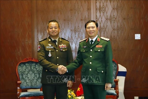Вьетнам укрепляет сотрудничество в области обороны с Лаосом и Камбоджеи hinh anh 2