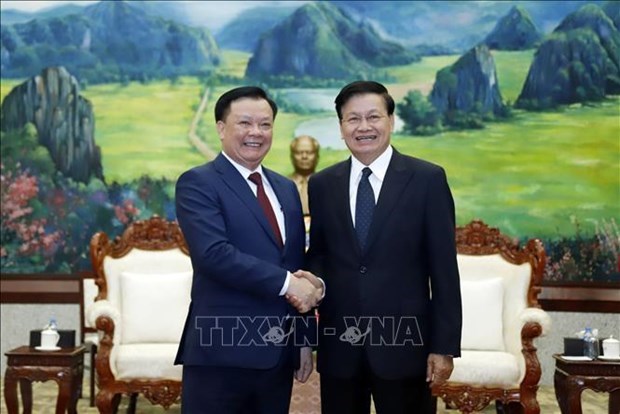 Высшии руководитель Лаоса высоко оценил сотрудничество между Ханоем и Вьентьяном hinh anh 1