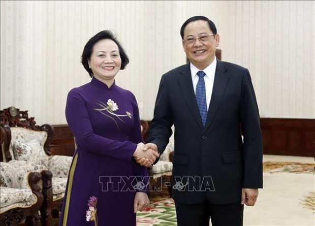 Премьер-министр Лаоса приветствует сотрудничество министерств Вьетнама и Лаоса hinh anh 1