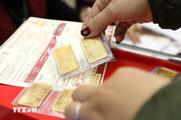 Центральныи банк возобновит торги золотыми слитками спустя 11 лет hinh anh 1