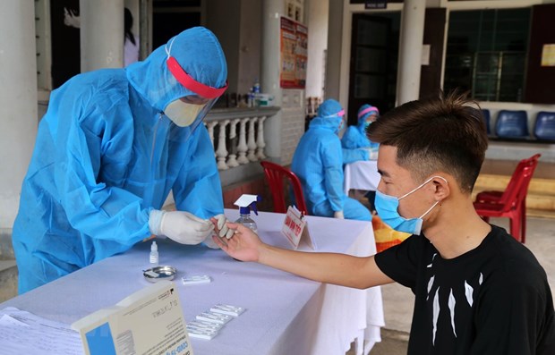 Вьетнам подтвердил еше 2 новых случая COVID-19, в результате чего общее число инфекции в стране достигло 672 hinh anh 1