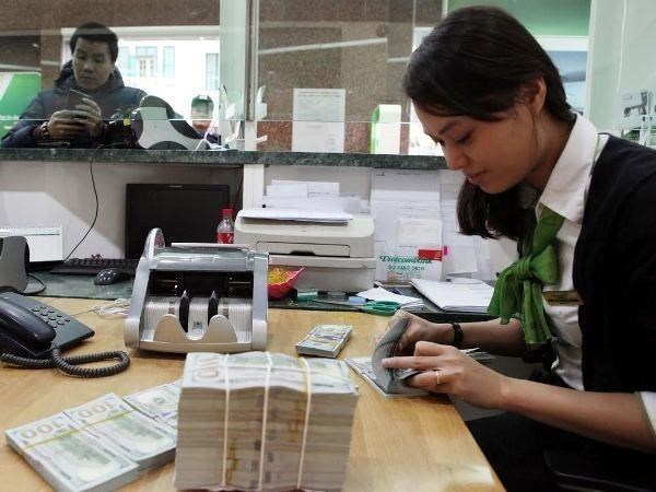 Госбанк: Вьетнам обладает достаточными ресурсами для стабилизации рынка форекс hinh anh 1