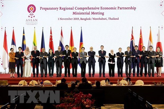 Подписание RCEP для помощи восстановлению экономики региона после окончания пандемии hinh anh 1