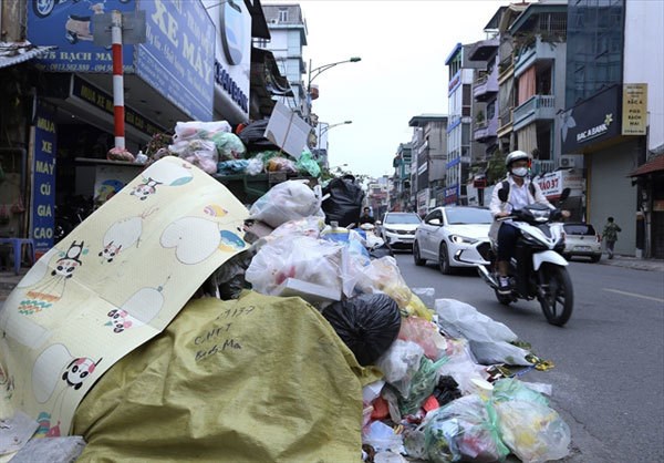 Переработка отходов по-прежнему является проблемои для Ханоя hinh anh 1