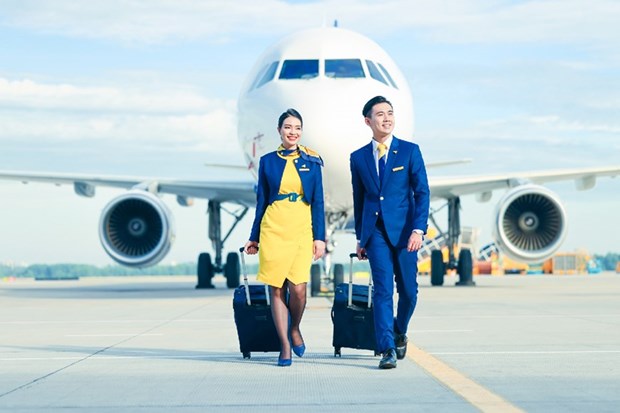 Компания Vietravel Airlines представила новую униформу и символ IATA hinh anh 3