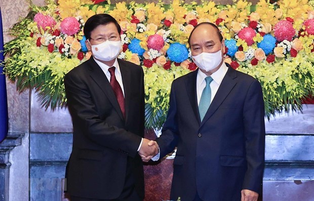 Визит президента с целью углубления особых отношении между Вьетнамом и Лаосом hinh anh 1