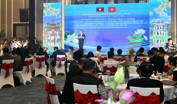 Ханои и Вьентьян продвигают сотрудничество в области инвестиции, торговли и туризма hinh anh 1