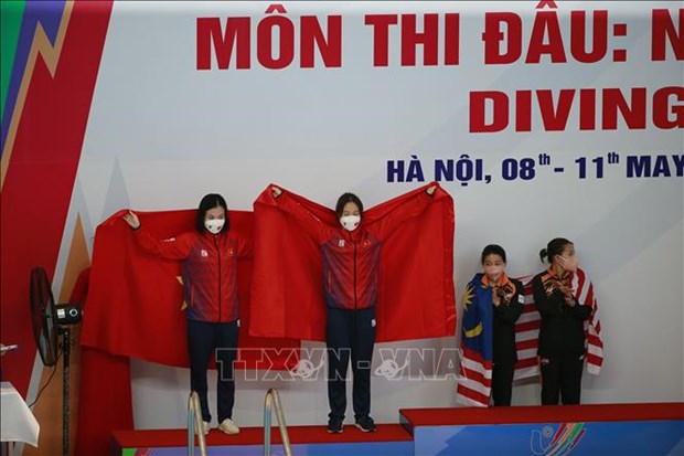 SEA Games 31: Сборная Вьетнама завоевала 2 серебряные и 3 бронзовых медали по прыжкам в воду hinh anh 1