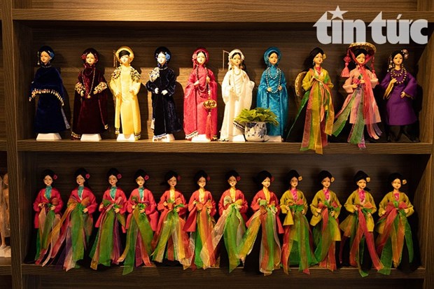 Художник продвигает одежду вьетнамских этнических меньшинств по всему миру с помощью кукол. hinh anh 4