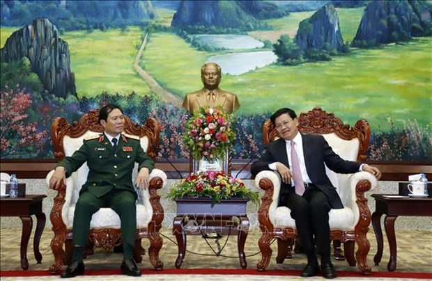 Вьетнам и Лаос укрепляют сотрудничество в области обороны hinh anh 1